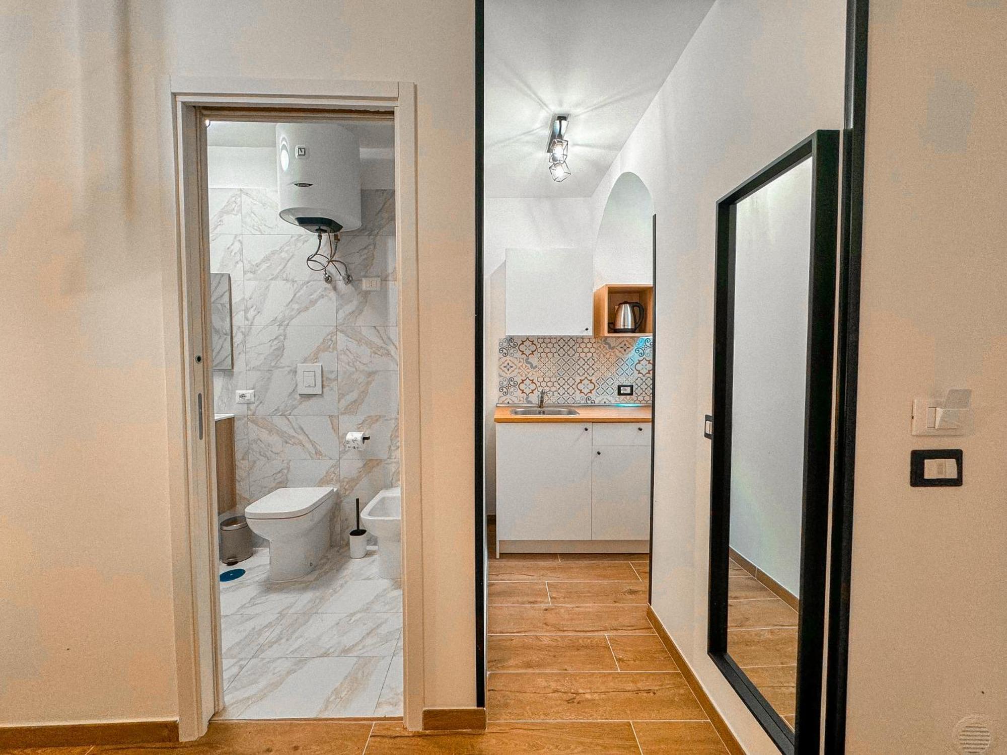 The Quarters Naples Apartments Bagian luar foto